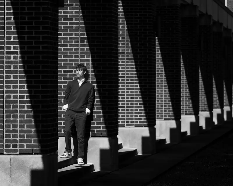 Senior portrait with bold, cinematic framing