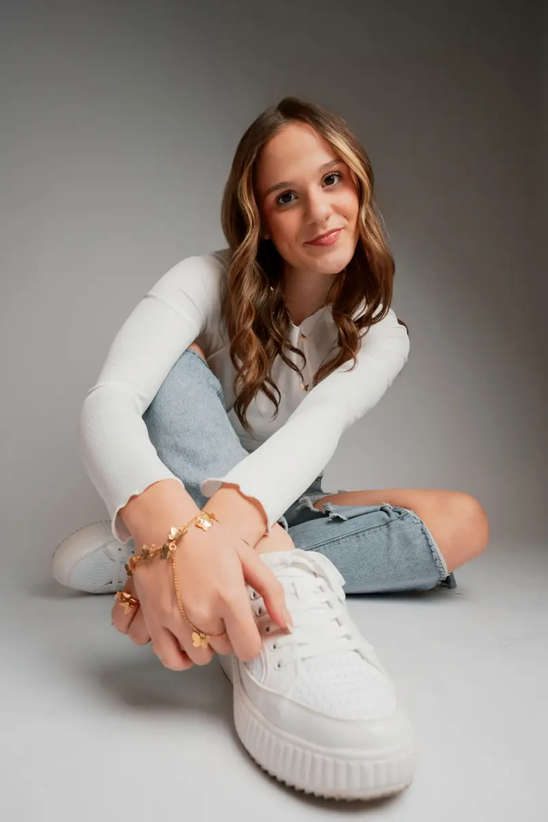 Two-person senior portrait with editorial framing