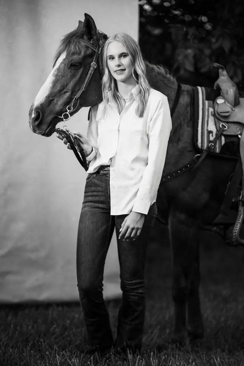 Cinematic senior portrait with expressive posing