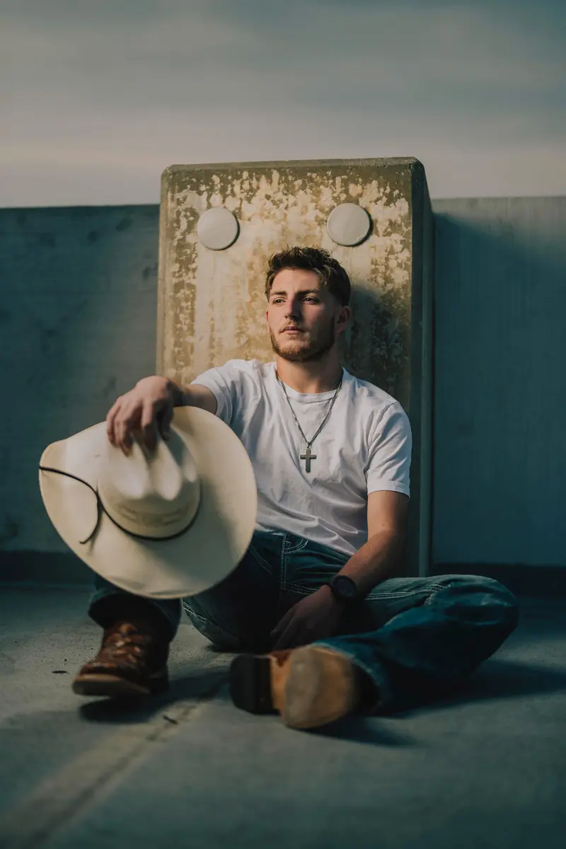 Editorial senior portrait with dramatic framing